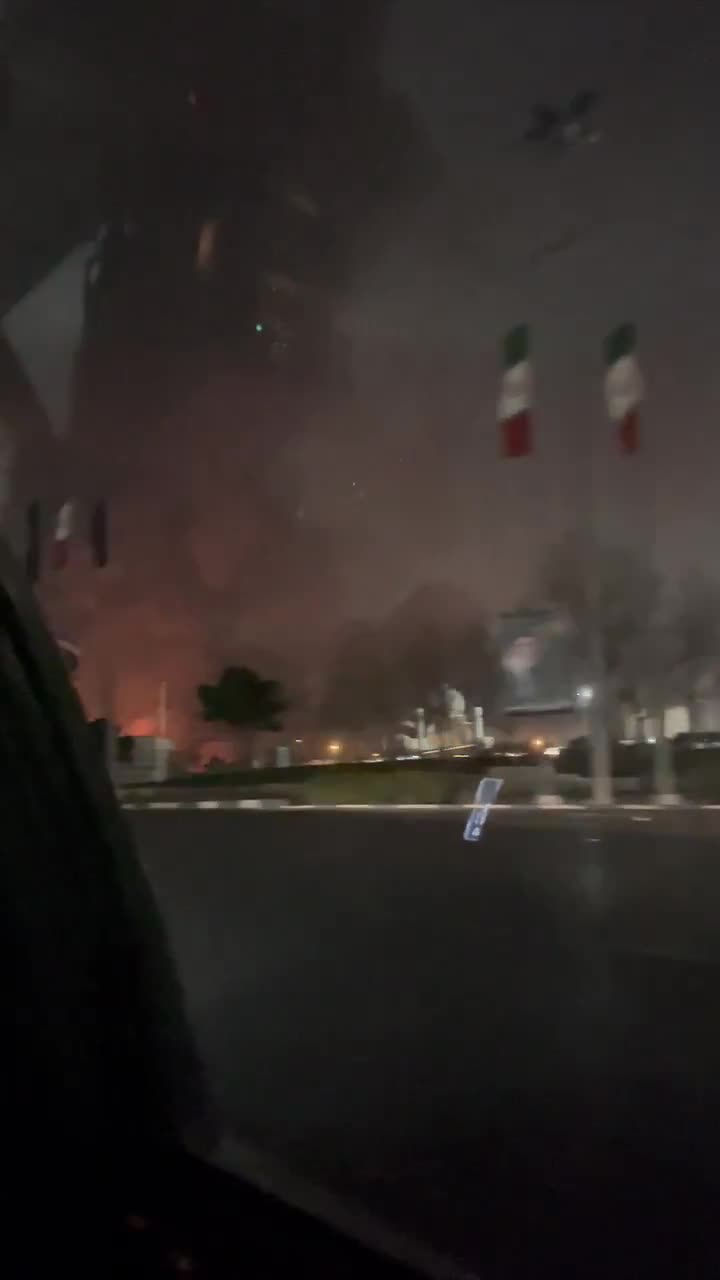 Smoke rising around Azadi Square a few minutes after it was hit