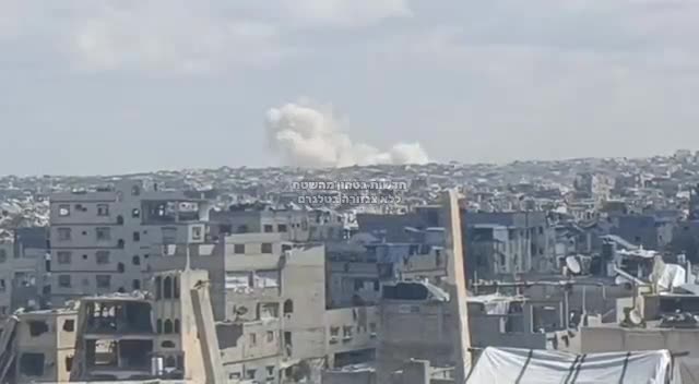 Warplanes launch an airstrike on Khan Younis in the southern Gaza Strip.