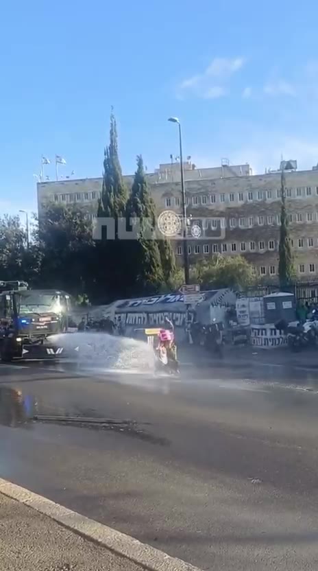 Hundreds protested outside the Knesset against the death penalty law for terrorists, riot police dispersed them