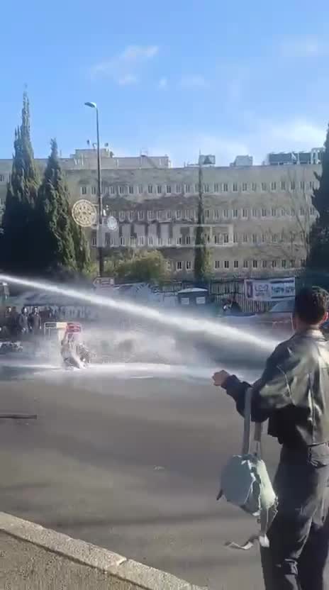 Hundreds protested outside the Knesset against the death penalty law for terrorists, riot police dispersed them