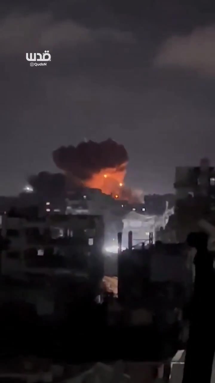 Moment of an airstrike by warplanes on a house in the Al-Shati refugee camp, west of Gaza City