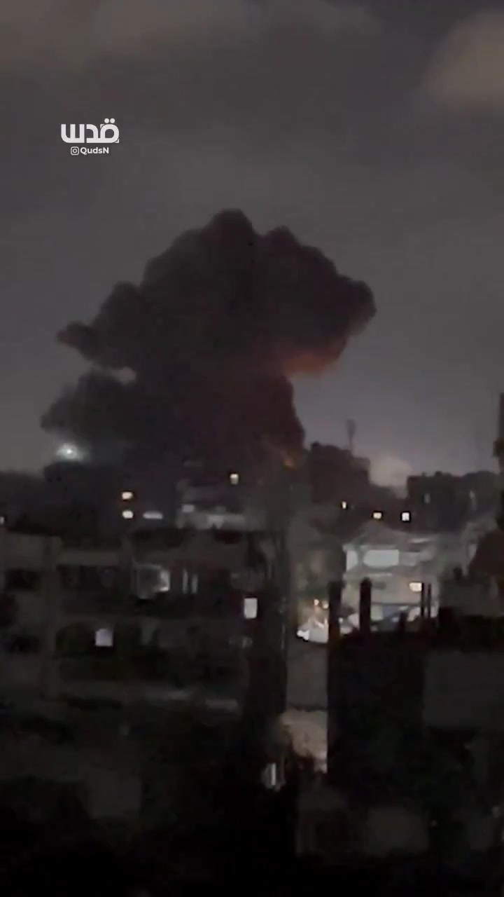 Moment of an airstrike by warplanes on a house in the Al-Shati refugee camp, west of Gaza City