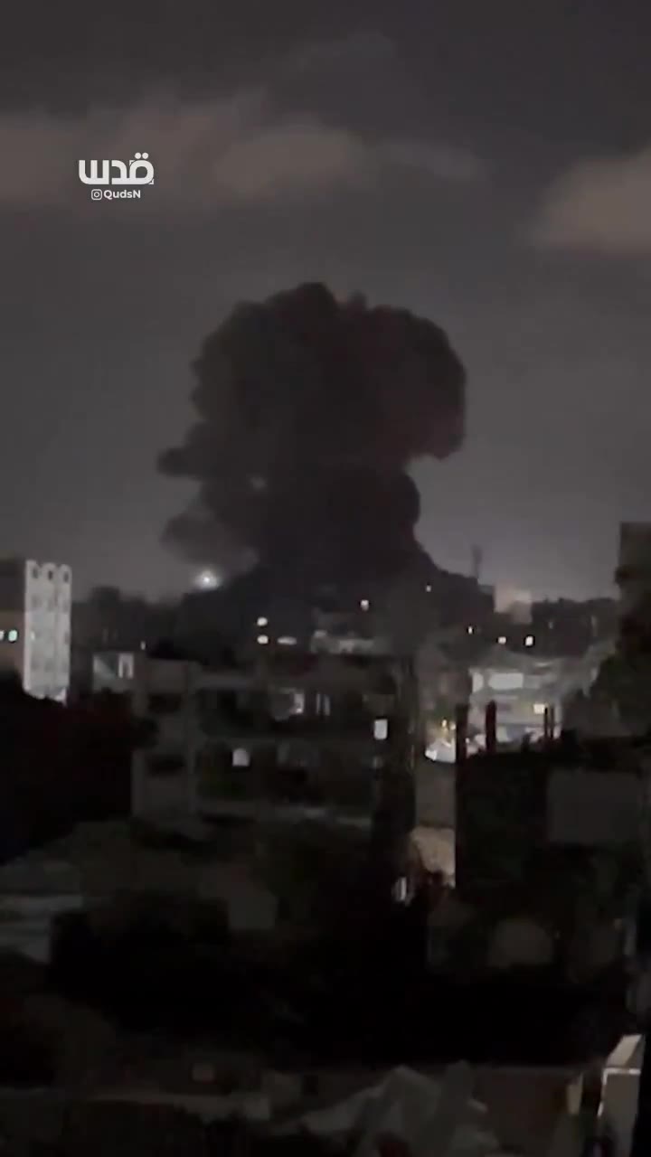 Moment of an airstrike by warplanes on a house in the Al-Shati refugee camp, west of Gaza City