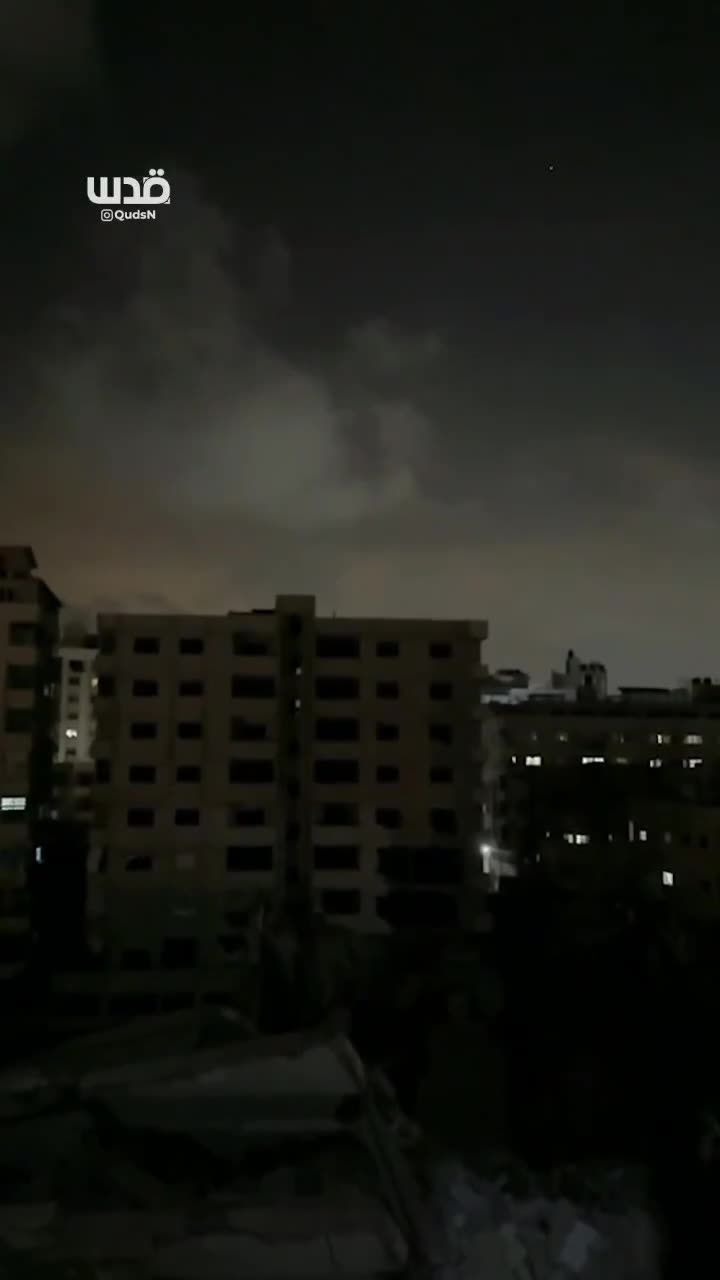 Moment of an airstrike by warplanes on a house in the Al-Shati refugee camp, west of Gaza City