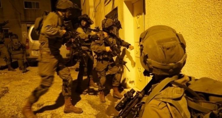 Thirteen Palestinians, including a child, were arrested during raids in the West Bank