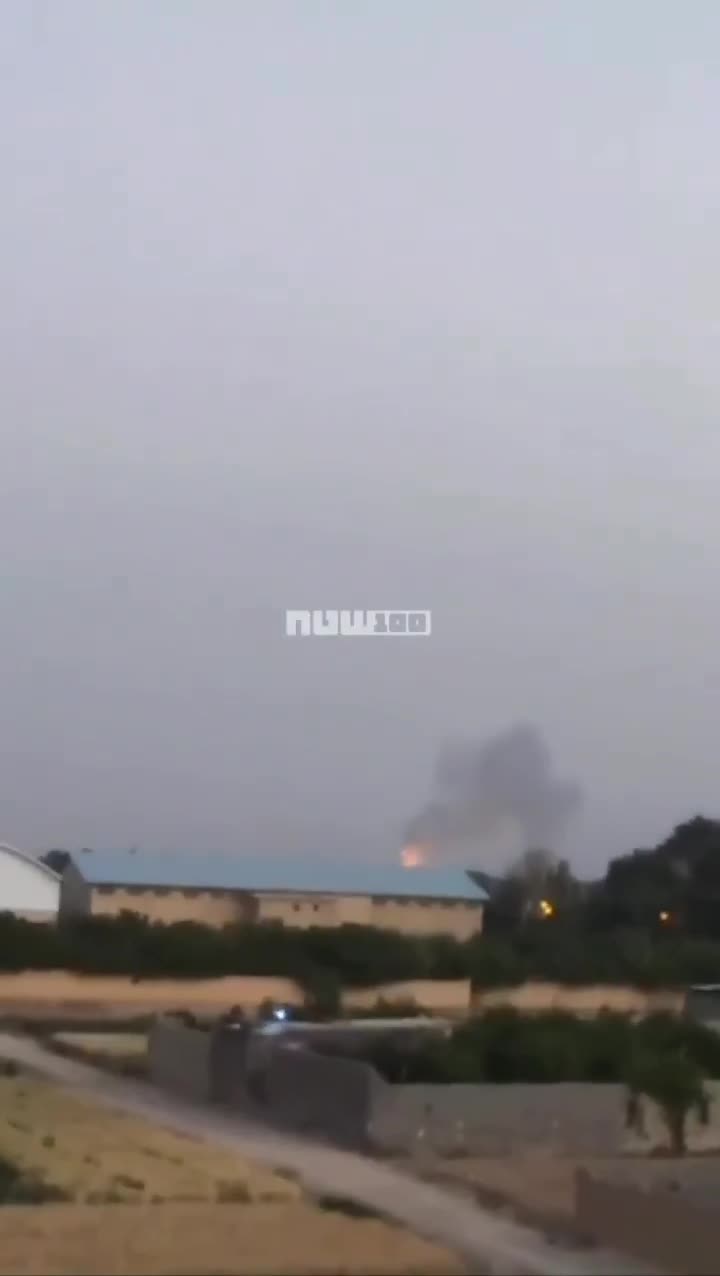 Smoke billows from the reported site of an Israeli strike in Isfahan, Iran