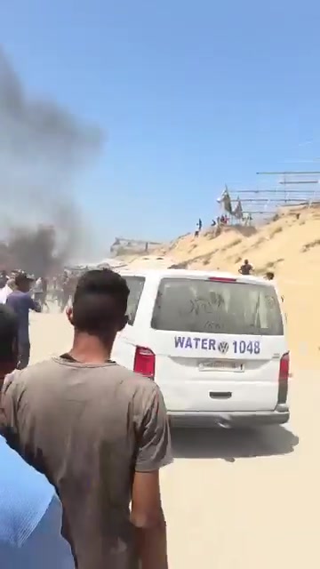 The first moments of the airstrike that targeted a civilian Jeep vehicle on Al-Tina Street, north of Khan Yunis city.