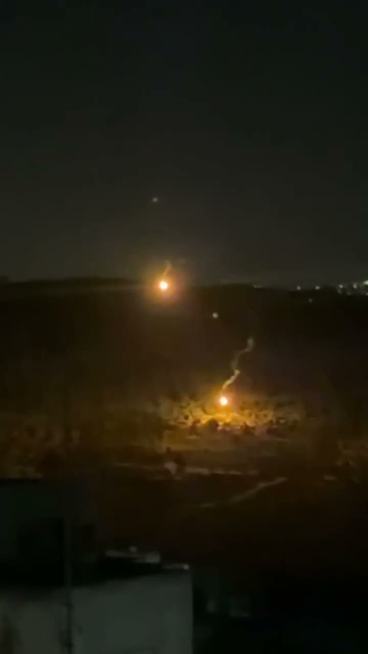 Israeli forces fire flares in the village of Deir Abu Mash'al, northwest of Ramallah, coinciding with the closure of the village.